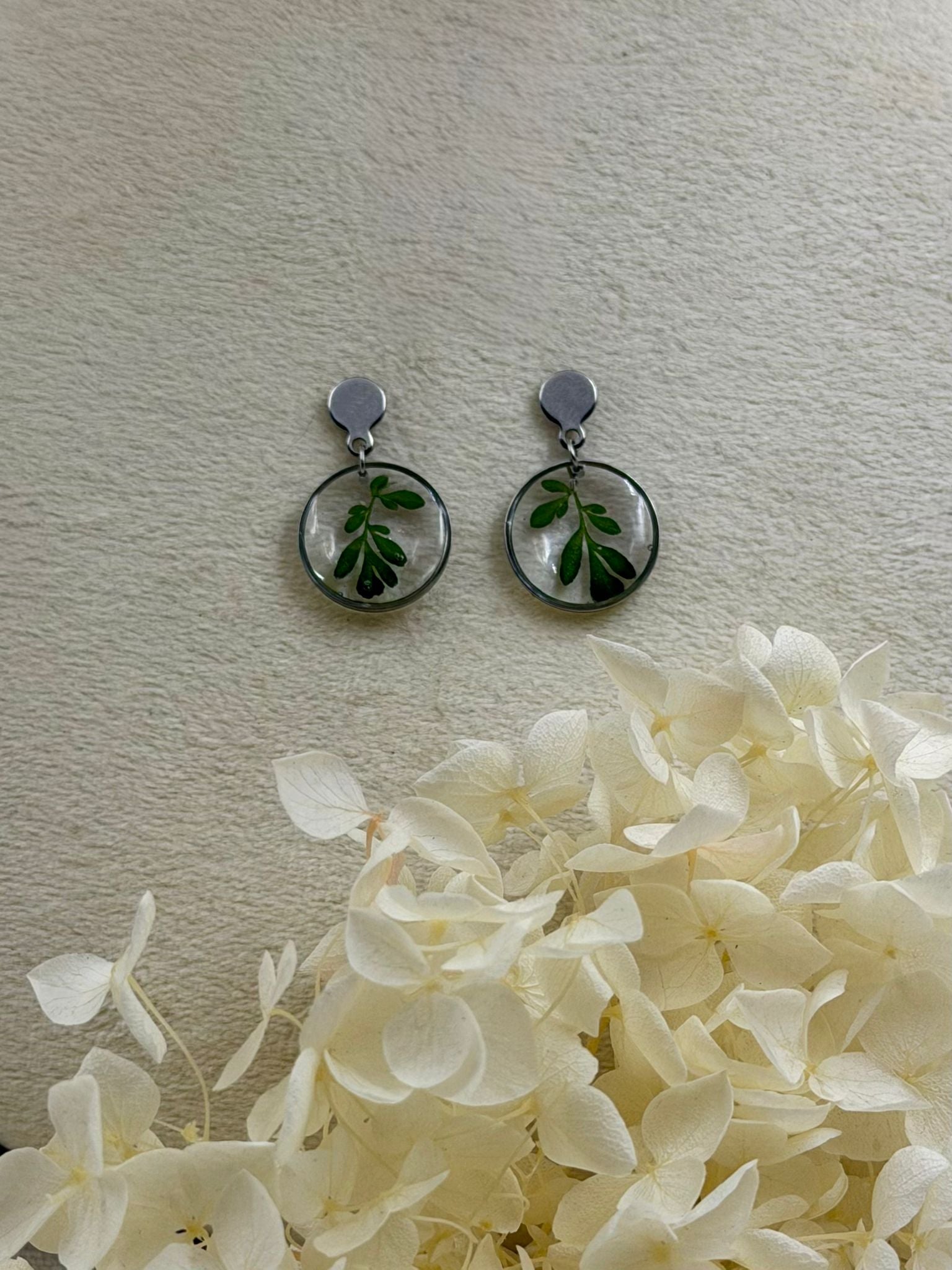 Brinco Raízes - Arruda